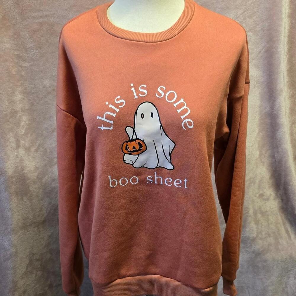 Orange crewneck sweatshirt with white
